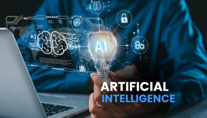 Artificial Intelligence AI - Robo Drone Tech - RoboDroneTech Person holding a glowing light bulb with AI icons and a laptop, representing What Is Technology Update JotechGeeks and showcasing artificial intelligence insights and tech updates.