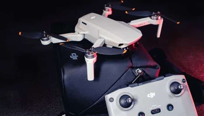 How Much Should You Spend on a Budget Drone - Robo Drone Tech - RoboDroneTech Best Budget Drones guide showing a compact DJI camera drone with remote controller, highlighting affordable aerial photography, portability, and beginner-friendly flight controls.